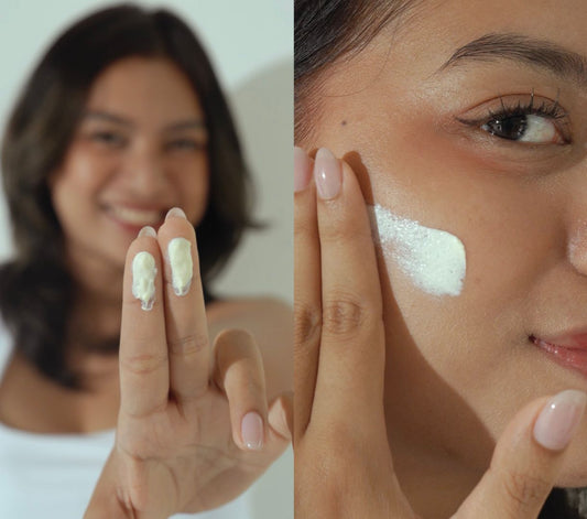 Woman applying sunscreen using the two-finger rule.